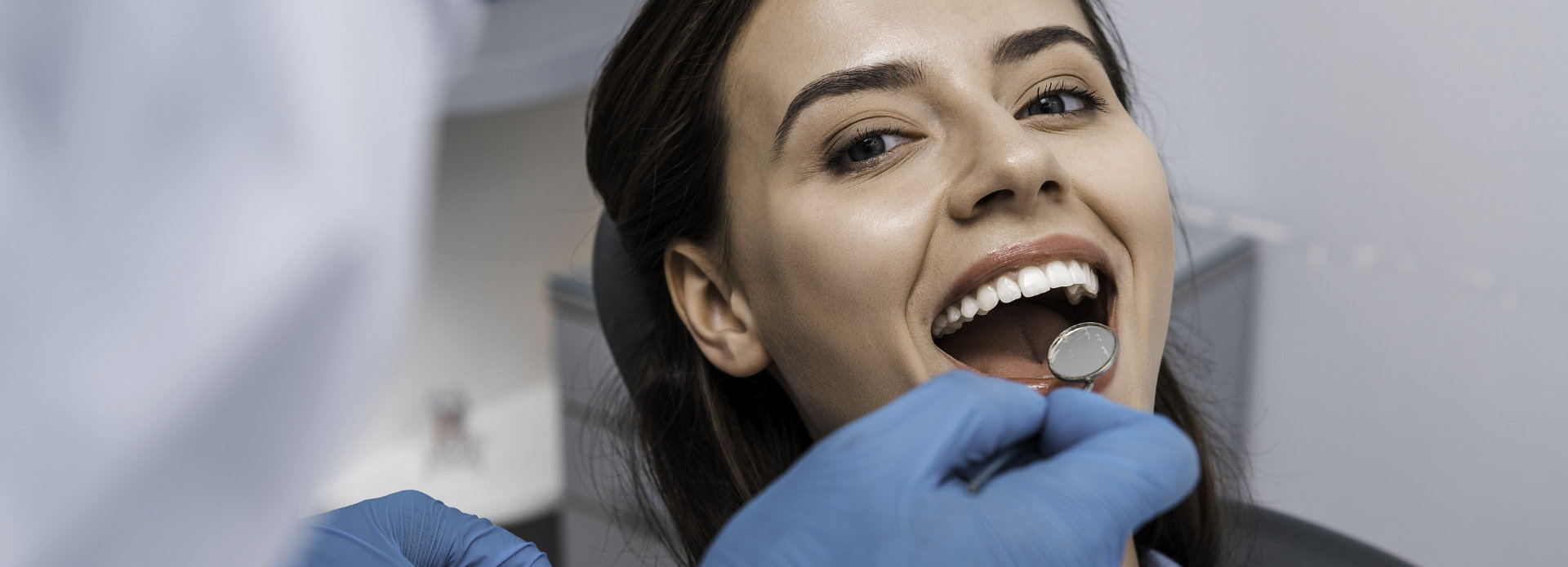 young woman in a dental chair during dental checkup
