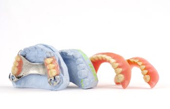 A set of dentures on a white background.