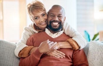 Happy senior Afro-American couple with perfect smiles
