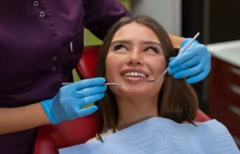 Patient smiling during same day dental extraction visit