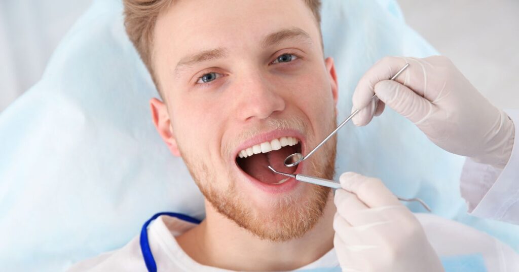 Dentist providing professional dental treatment to improve gum health and prevent periodontal disease.